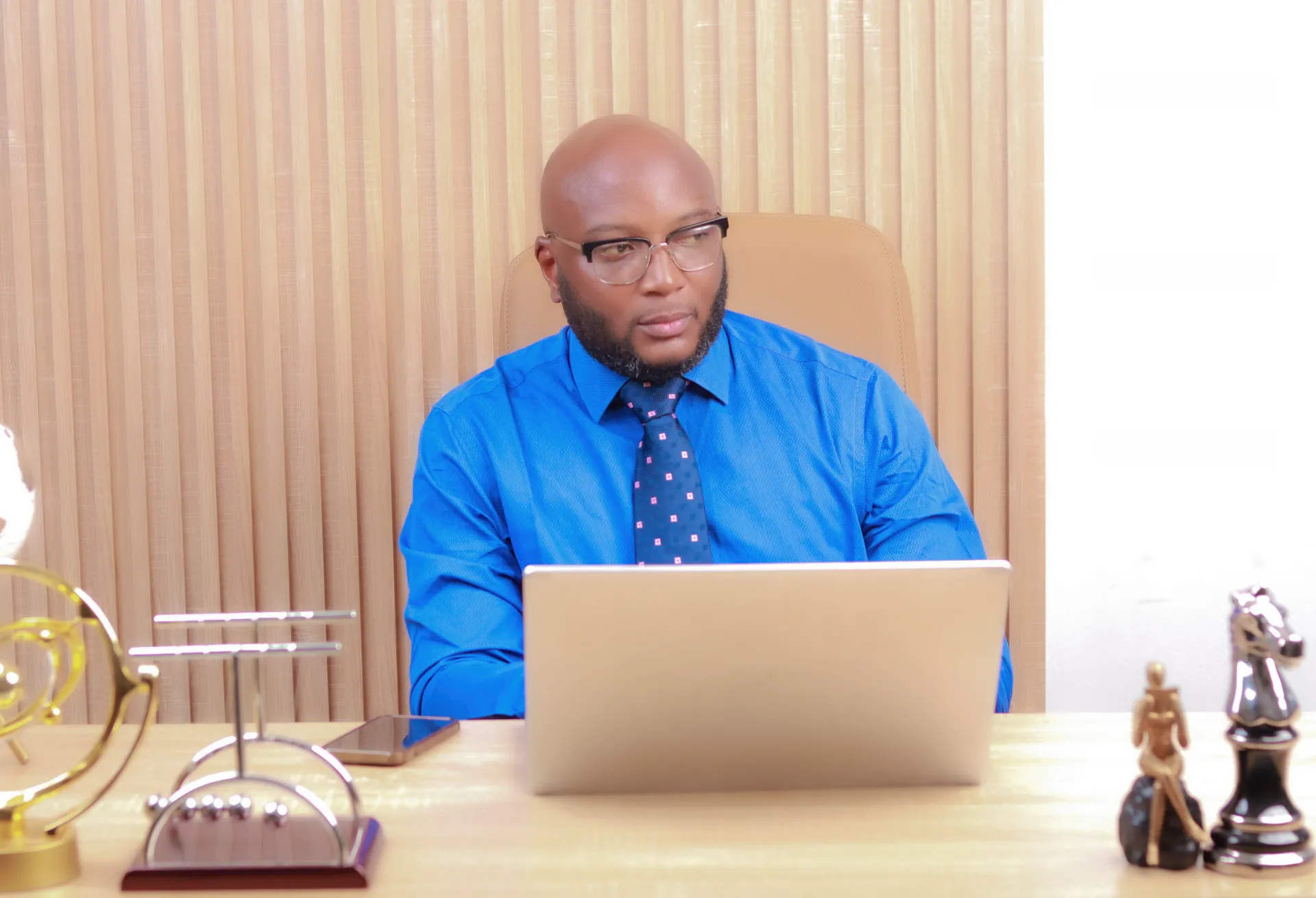 Adegoke Shittu working from his executive office